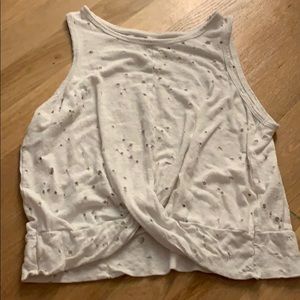 White tank with holes